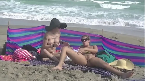 Exhibitionist Wife 484 Part 5 - Mrs Ginary and Mrs Nikki Brooks Teasing Nude Beach Voyeur!  Spreading legs and teasing cocks in public!