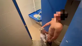 I surprise the gym cleaning girl who when she comes in to clean the toilet she catches me jerking off and helps me finish cumming with a blowjob