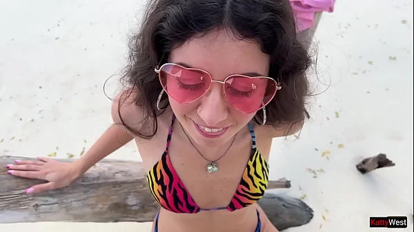 Golden shower for Katty on the public beach