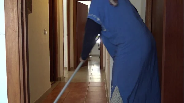 A Muslim cleaning maid is disturbed when she sees his big black cock