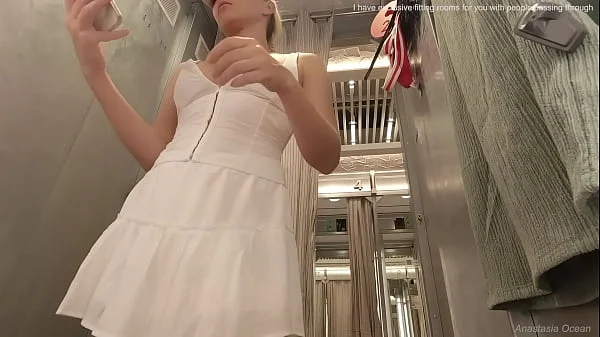 Sexy try on haul clothes fitting in the mall. Naked  in the fitting room of the mall
