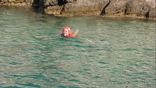 Blue water and a naked girl!