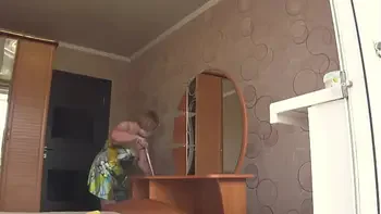 Neighbor watches chubby milf through open window. PAWG.