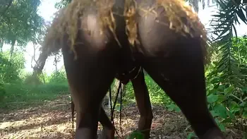 African jungle perfect tits tribe girl making strange medicine in the forest documentary style