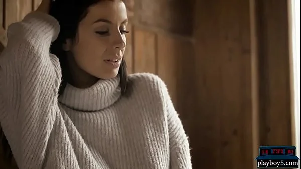 Perfect brunette babe gives a striptease and poses