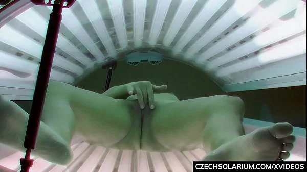Beautiful Brunette Masturbating in Solarium