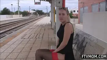 Milf masturbates on the train station