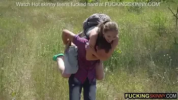 Skinny couple goes hiking and ends up fucking in the grass