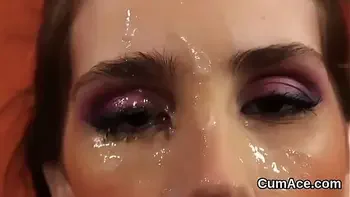 Unusual centerfold gets sperm load on her face sucking all the jizz