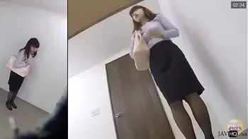 Office Lady wetting herself in the bathroom