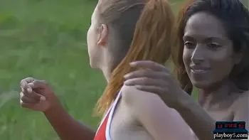 Dark and white chocolate lesbian play in the outdoors