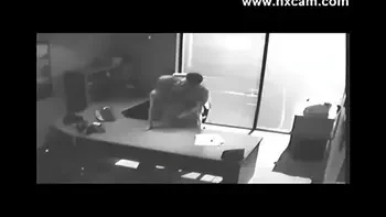 Security camera Films Sex At Office On Desk