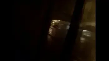 hangin out nude in a store front on main street