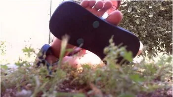 Nicolettas Sexy Feet In The Garden Are Wearing Flip-flops