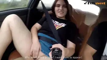Public masturbation of a brunette in a car on the go. (eng sub)