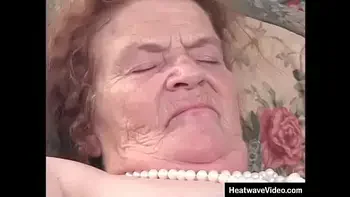 Very old woman in a wheelchair to get around  is still horny