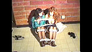 Two secretaries in their stocking feet