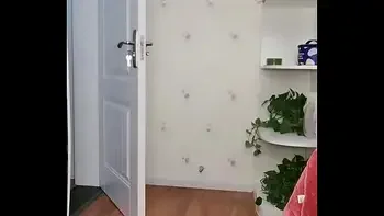 Chinese girl using chair legs as dildo