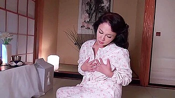 02K2822- Widowed wife masturbating in front of her husband's remains