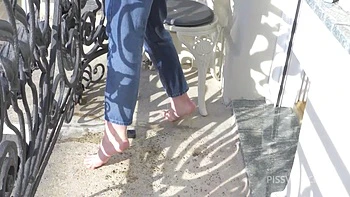 Wetting Jeans And Smoking On Balcony