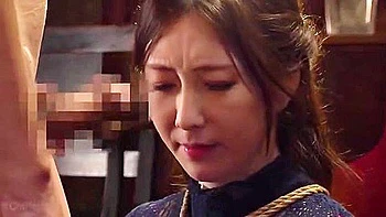 He holds her head down and thrusts his penis deep into her throat, ejaculating into her mouth.