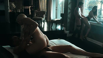 Four cute babes share a big dick in a hot foursome