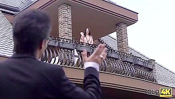 Old Husband And His Young Spouse Relax Together In Bedroom