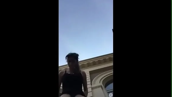 busty teen girl strip naked in public city square