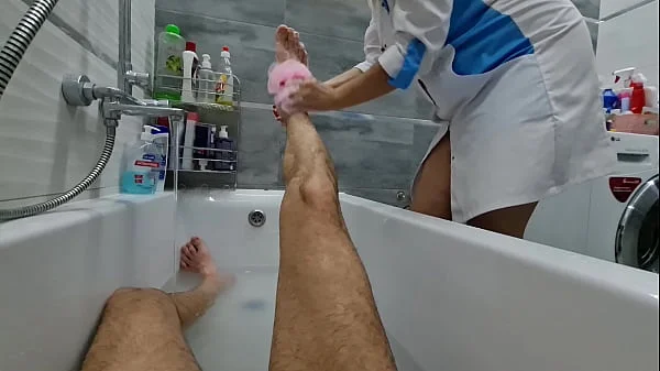 FAMILY FANTASY - A nurse jerks off a man's cock in the bathroom