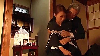 The widow is tied up naked and thrusts in and out deep into her throat, then has wax dripped on her.