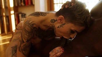 Hot interracial action with Rob Piper and Leigh Raven in lingerie