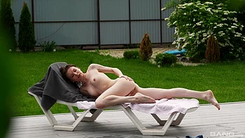 A sexy girl named Milka Wey plays with her pussy outdoors.