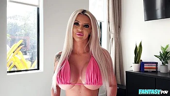 Silicone-boobed blonde Mckala Noel is playing with a big cock