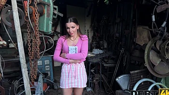 A hot chick, Arina Shy, plays with a vibrator under a skirt.