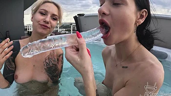 Two hot babes fucking naked in jacuzzi