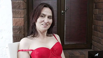 Gorgeous busty mature Lira Red knows how to have fun in solo