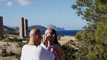 Stacy Cruz and Christian Clay have fun by the pool