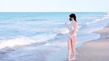 Slim Asian Babe Solo on Beach