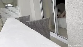 Hot spanish girl was secretly filmed in her hotel room through the window while she was taking some nude photes.