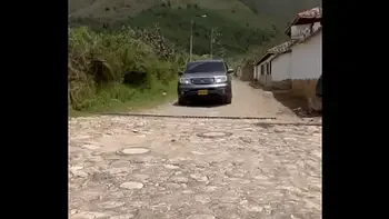 Two lesbians touch each other to orgasm on the corner of a town trying to avoid being seen by anyone