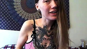 Busty curly brunette with big boobs fucks on couch