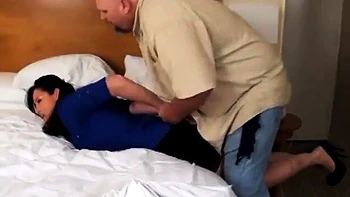 Pretty blue shirt woman on bed